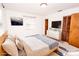 Main bedroom with TV, dresser, and neutral decor at 198 Dunlap Loop, Statesville, NC 28625