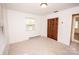 Simple bedroom with carpet, window, and closet at 198 Dunlap Loop, Statesville, NC 28625