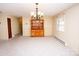 Bright dining room with chandelier and built-in hutch at 198 Dunlap Loop, Statesville, NC 28625