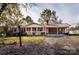 Brick ranch house with carport and front yard at 198 Dunlap Loop, Statesville, NC 28625