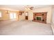 Open living room with fireplace and view to kitchen at 198 Dunlap Loop, Statesville, NC 28625