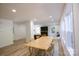 Bright dining area with wood table and chairs, overlooking the deck at 3995 Burton Ln, Denver, NC 28037