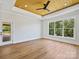 Bright, airy bedroom features a trey ceiling, large picture window, and access to the outdoor deck at 4539 Polk Ford Rd, Stanfield, NC 28163
