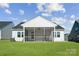 Screened porch provides an outdoor space with ceiling fan and views of the backyard at 9088 El Sworth Dr, Sherrills Ford, NC 28673