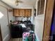 Laundry room with washer, dryer, and cabinets at 325 Scaley Bark Dr, Salisbury, NC 28147