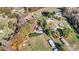 Aerial view of property with multiple buildings and surrounding land at 448 Johnson Dairy Rd, Mooresville, NC 28115