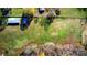 Overhead view of large green pasture and outbuildings at 448 Johnson Dairy Rd, Mooresville, NC 28115