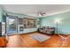 Living room with hardwood floors and view of porch at 448 Johnson Dairy Rd, Mooresville, NC 28115