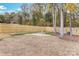 Spacious backyard with fire pit and wooden fence at 7039 Executive Cir, Denver, NC 28037