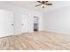 Bright bedroom with hardwood floors and ceiling fan at 7039 Executive Cir, Denver, NC 28037