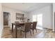 Dining area with sliding glass doors to backyard at 7039 Executive Cir, Denver, NC 28037