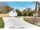 Detached garage with concrete driveway at 7039 Executive Cir, Denver, NC 28037