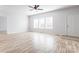 Bright living room with hardwood floors and lots of natural light at 7039 Executive Cir, Denver, NC 28037