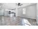 Open living room and kitchen with LVP flooring at 102 S Liberty St, Gastonia, NC 28052