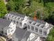 Birds-eye view of newly built townhomes showcasing modern design and lush surroundings, perfect for serene living at 1419 Collier Walk Aly # Csw0208, Charlotte, NC 28205
