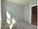 Bright, carpeted bedroom with plenty of natural light at 1419 Collier Walk Aly # Csw0208, Charlotte, NC 28205