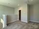 This versatile bonus room features plush carpet, neutral walls, and recessed lighting at 1419 Collier Walk Aly # Csw0208, Charlotte, NC 28205