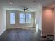 Well-lit bedroom with hardwood floors and neutral wall colors at 1421 Collier Walk Aly # Csw0209, Charlotte, NC 28205