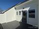 Private deck with gray composite decking and exterior door access at 1421 Collier Walk Aly # Csw0209, Charlotte, NC 28205