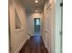 Hallway with light flooring and access to rooms at 1421 Collier Walk Aly # Csw0209, Charlotte, NC 28205