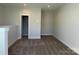 Loft area with carpeted floor and an additional closet at 1421 Collier Walk Aly # Csw0209, Charlotte, NC 28205