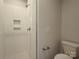 Clean bathroom with a walk-in shower and geometric tile at 1423 Collier Walk Aly # Csw0210, Charlotte, NC 28205