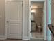 Modern bathroom with floating vanity and marble-look floors at 1423 Collier Walk Aly # Csw0210, Charlotte, NC 28205