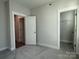 Bright bedroom with access to hallway and closet at 1423 Collier Walk Aly # Csw0210, Charlotte, NC 28205