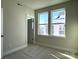 Spacious bedroom with two large windows and neutral decor at 1423 Collier Walk Aly # Csw0210, Charlotte, NC 28205