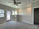 Spacious bedroom with private access to deck and abundant natural light at 1423 Collier Walk Aly # Csw0210, Charlotte, NC 28205