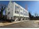 Modern townhome community with attached garages and ample parking at 1423 Collier Walk Aly # Csw0210, Charlotte, NC 28205
