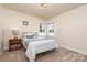 Cozy bedroom with ample natural light and carpeting at 1009 Amber Ct, China Grove, NC 28023