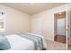 Bright bedroom with double doors leading to hallway at 1009 Amber Ct, China Grove, NC 28023