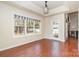 Bright dining area with hardwood floors and large windows offering natural light at 1009 Amber Ct, China Grove, NC 28023