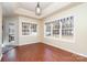 Sunlit dining area with hardwood floors and backyard access at 1009 Amber Ct, China Grove, NC 28023