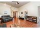 Open living room with hardwood floors and built-in shelving at 1009 Amber Ct, China Grove, NC 28023