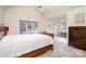 Vaulted ceiling bedroom with large windows and carpeted floors at 1009 Amber Ct, China Grove, NC 28023