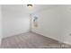 Bright bedroom with carpeted floor and window at 1021 Freeman View Dr # 154P, Albemarle, NC 28001