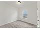 Bright bedroom with carpeted floor and window at 1021 Freeman View Dr # 154P, Albemarle, NC 28001