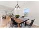 Farmhouse-style dining room with wooden table and black chairs at 1021 Freeman View Dr # 154P, Albemarle, NC 28001