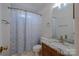 Bathroom featuring a marble countertop vanity and shower with curtain at 117 Eagle Ct, Mooresville, NC 28117