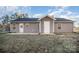 Backyard featuring a gray vinyl exterior and a concrete patio at 1681 Evans Dr, Lancaster, SC 29720