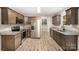 Well-equipped kitchen with stainless steel appliances, granite countertops, and ample cabinet space at 1681 Evans Dr, Lancaster, SC 29720