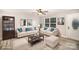 Staged living room with comfortable sofas, stylish decor, and a bright, welcoming atmosphere at 1681 Evans Dr, Lancaster, SC 29720