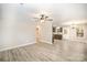 Bright open living space with modern vinyl floors leading to an open concept kitchen area at 1681 Evans Dr, Lancaster, SC 29720