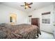 Cozy bedroom with a dresser and two windows at 2111 Priory Ct, Charlotte, NC 28262