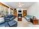 Gathering room with built-in shelving and a gas fireplace at 2111 Priory Ct, Charlotte, NC 28262