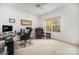 Home office with a large window, comfortable chair, and desk at 2111 Priory Ct, Charlotte, NC 28262