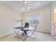 Home office with large desk, comfortable chair, and natural light at 2111 Priory Ct, Charlotte, NC 28262