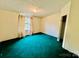 Bedroom with green carpet and walk-in closet at 5199 Helms End Of Trl, Lincolnton, NC 28092